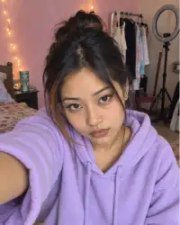 Asmita, 24 — selfie in her room in Worli