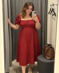 Milana, 29 — mirror selfie in a red dress in a trial room