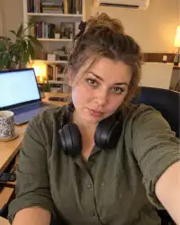 Milana, Russian escort in Mumbai — selfie at her desk