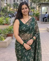 Vaishali — housewife escort in Mira Road in a green saree in her society garden